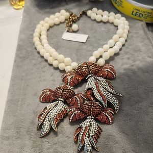 Heidi Daus Elegant White Bead Necklace with Orange and White FishCrystal Pendant